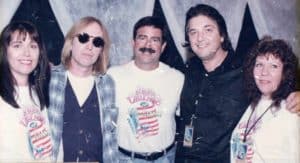 Photo of Tom Petty, Shad Meshad, Bernie Gudvi and friends at 1995 Benefit Concert